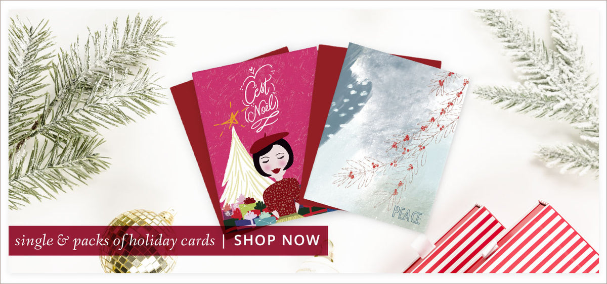 Cute holiday cards on a white background with ornaments, gifts & evergreen branches. Shop single & packs of holiday cards at The Spotted Olive.